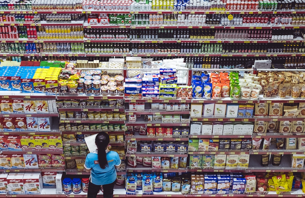 Store worker stacking shelves